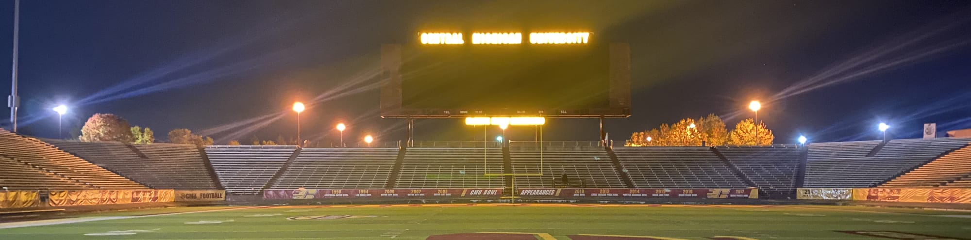 empty football stadium at night under the lights Louisville