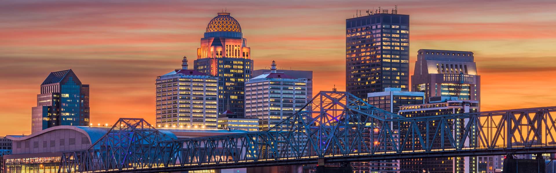 Neon color image of a band playing and people singing along